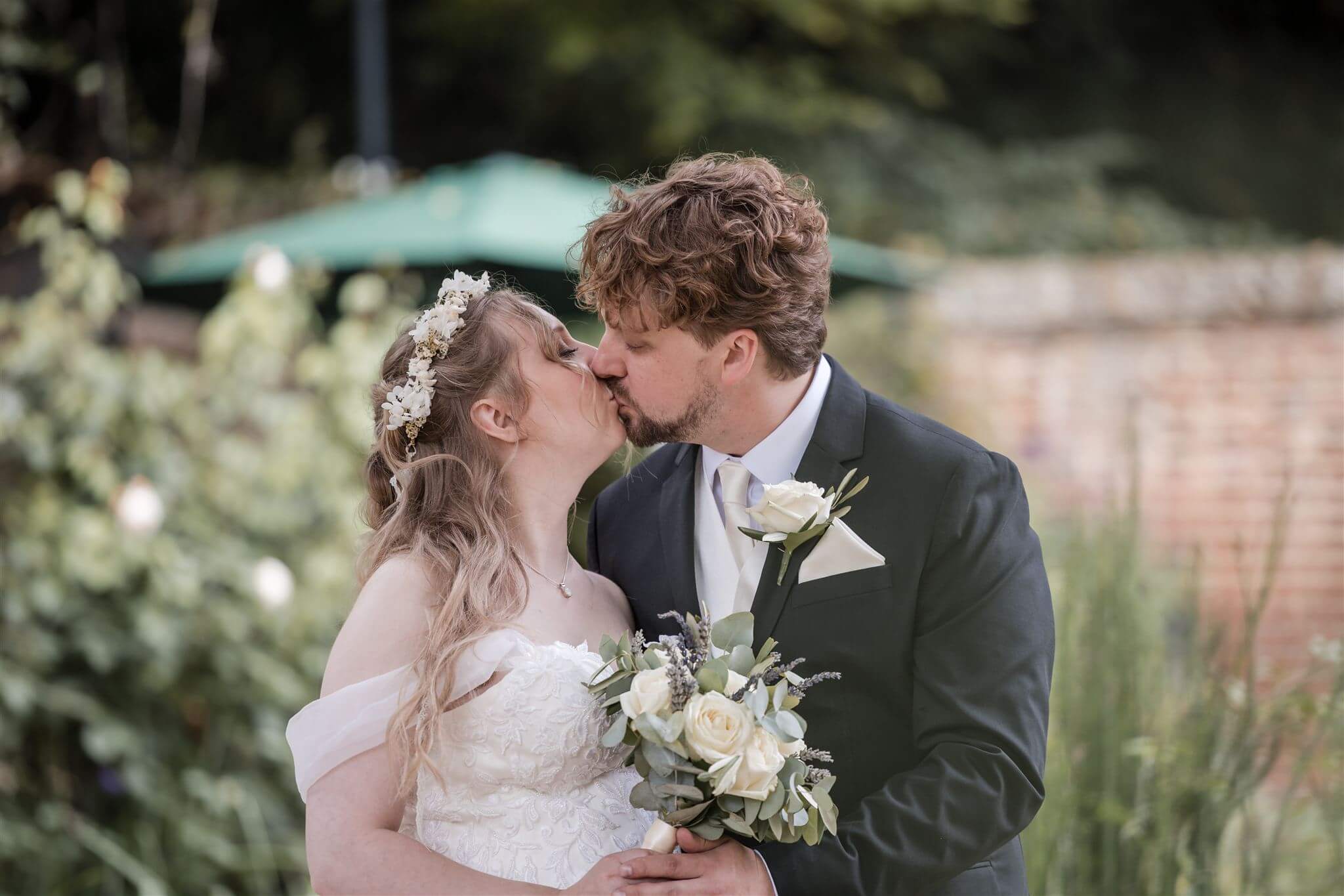 Annabelle and Peter kissing after their ceremony at Salisbury Registry Office.